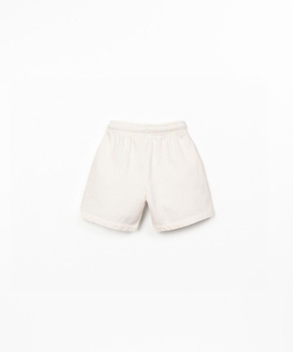 Calção em algodão orgânico com desenho à frente